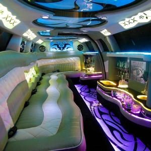 Interior of Jet Door Limousine with a blue laser lit ceiling and purple foor