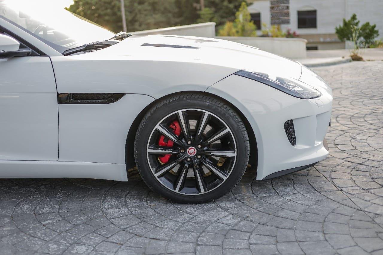 The front wheel of the jaguar f type sports car