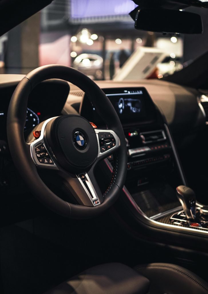Interior of a luxury car showing the steering wheel