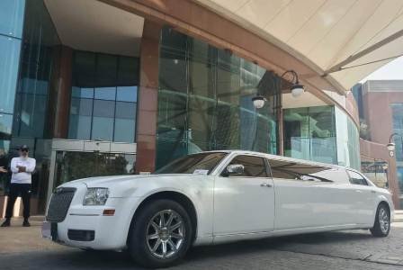 Luxury Taxi Limousine Chrysler in front of a seven star hotel in Beirut