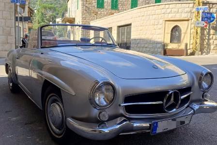 Vintage wedding car Mercedes SL 190 silver parked in an old village in Lebanon