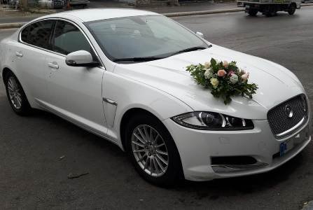 New Jaguar wedding car XF type with wedding flower decoration