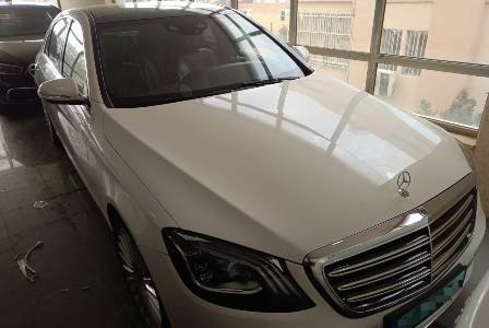 VIP Taxi S Class White 2020 inside showroom of company